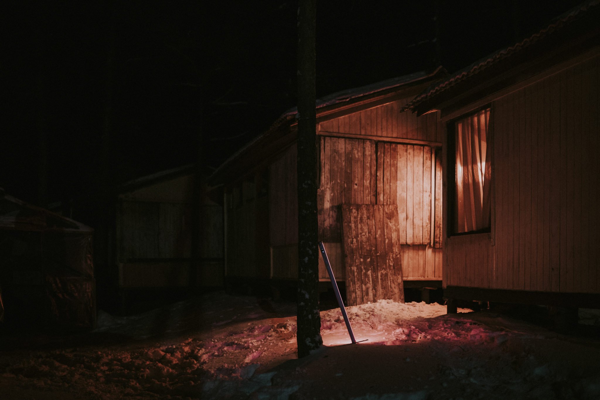 Shed in the dark with lights on